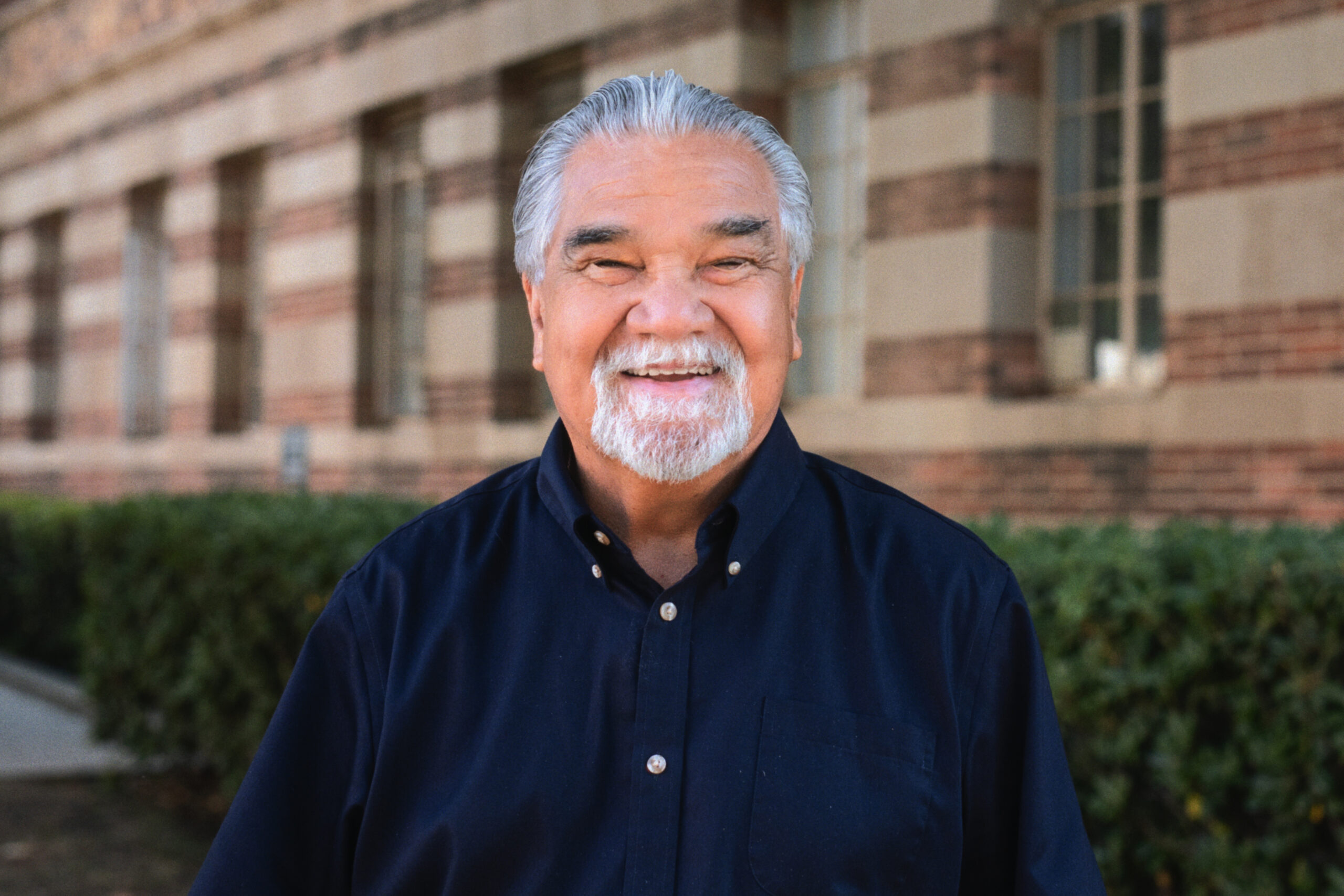 Dr. Daniel Solorzano in front of Moore Hall
